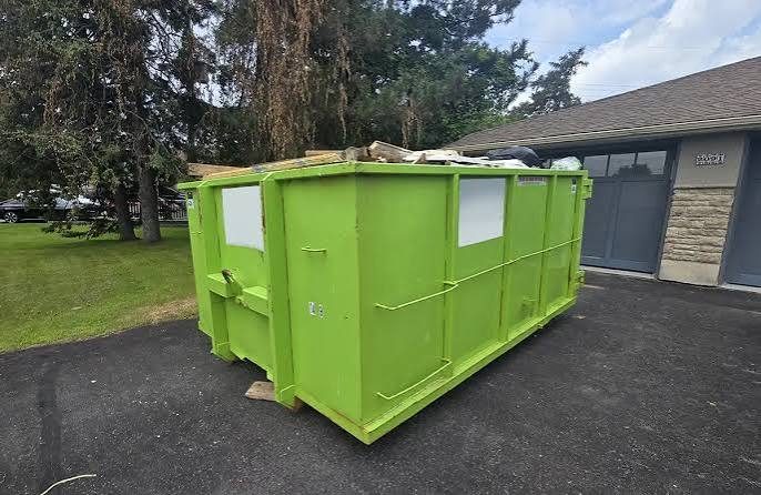 10-yard dumpster rental placed on an asphalt driveway in Panaca, NV